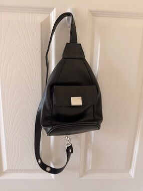 Black Leather Sling Backpack with Silver Hardware